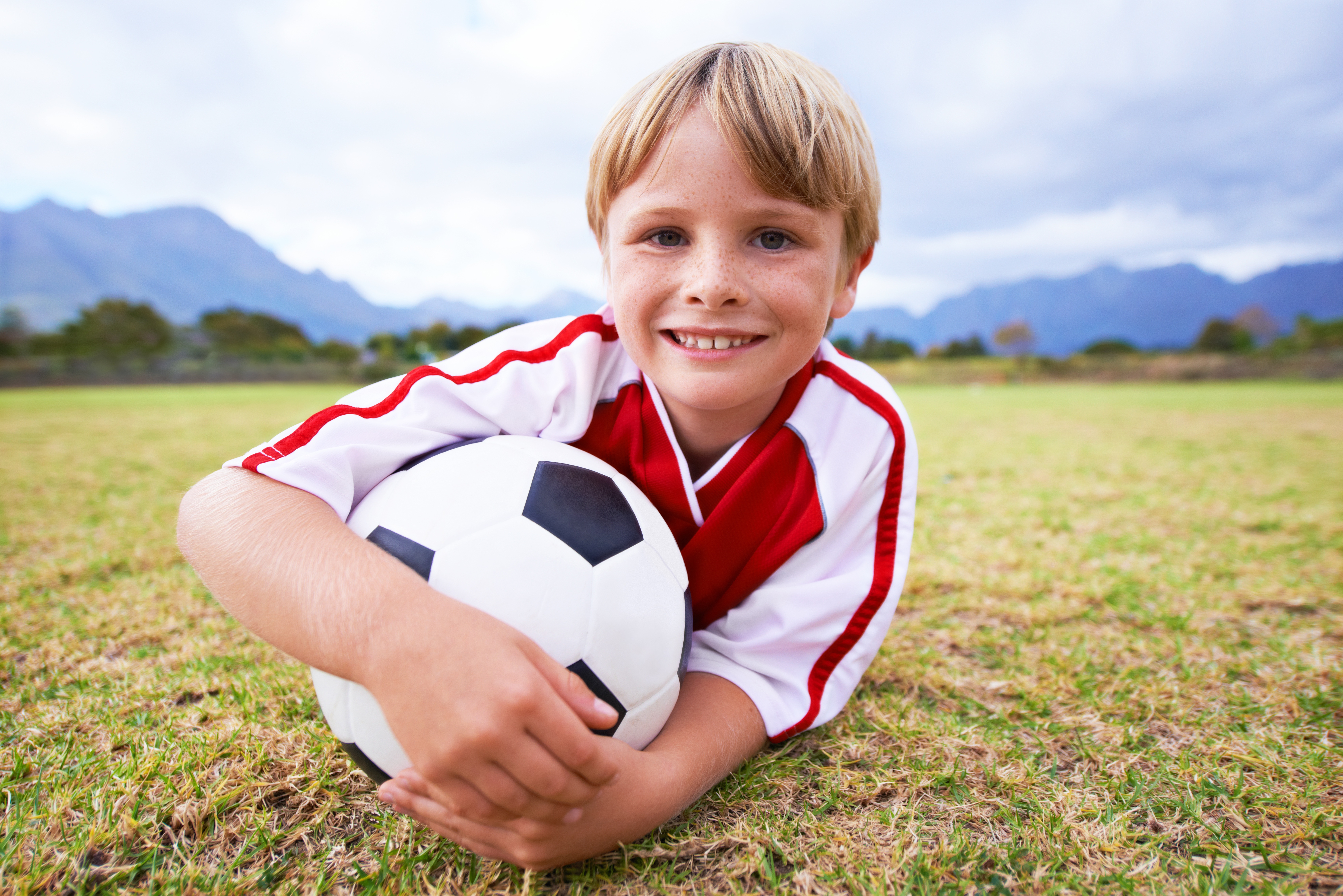 Youth soccer player with gear